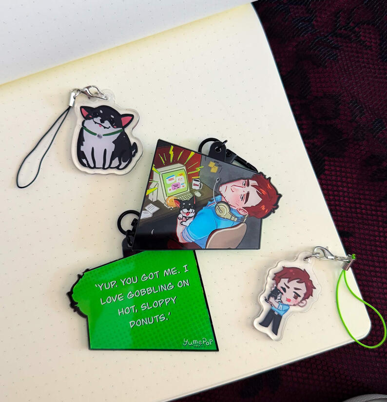 1 inch acrylic phone charms, double sided. 2.5 in acrylci keychain with comic panel design and quote, double sided.