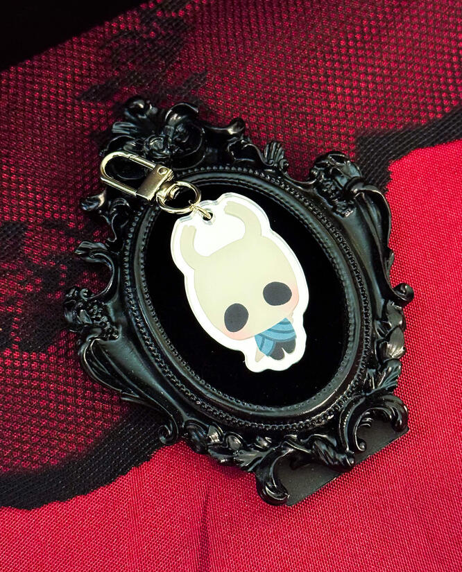 2 in acrylic charms, double sided, silver mirror finish.