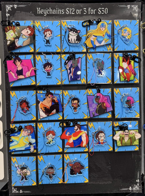 LVLUP Expo 2026 - Keychain display. All keychains ahve different custom backing cards to differentiate fandoms.