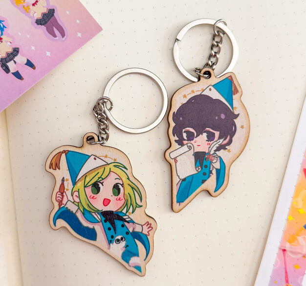 Wooden keychains that form a heart design. My bestie designs one half, and I the other. 2026.