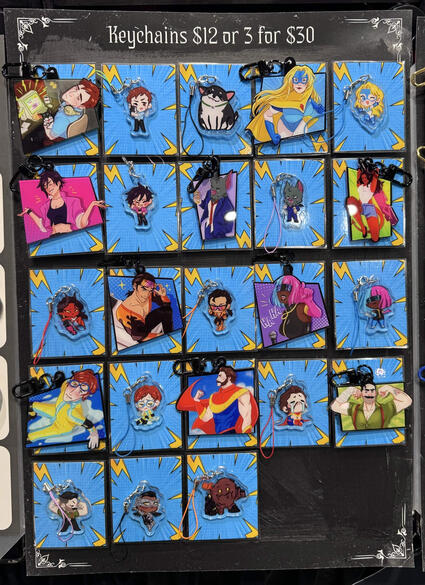 LVLUP Expo 2026 - Keychain display. All keychains ahve different custom backing cards to differentiate fandoms.