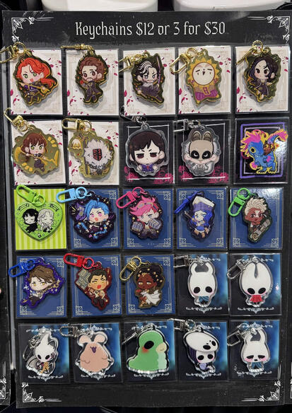 LVLUP Expo 2026 - Keychain display. All keychains ahve different custom backing cards to differentiate fandoms.